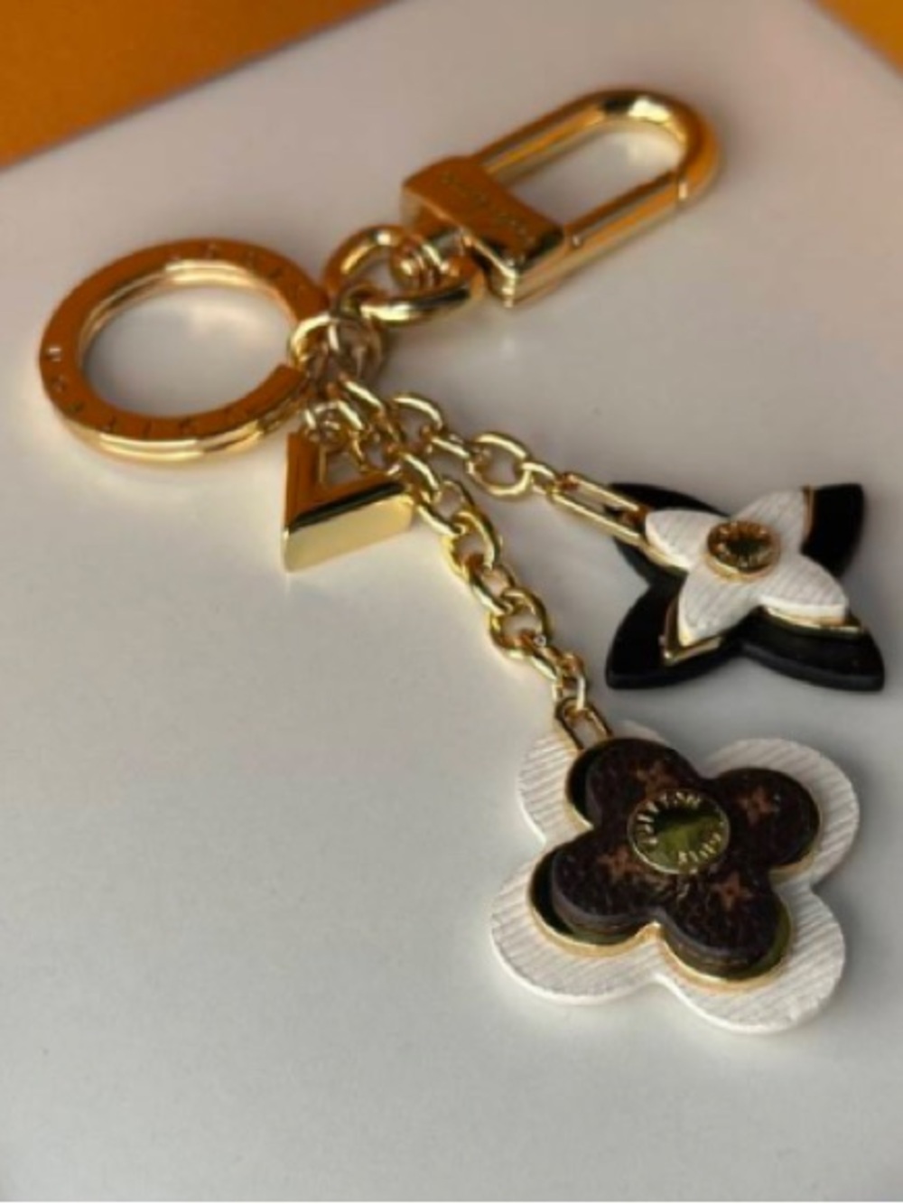 ***Louis Vuitton Logo Bag Charm & Key Holder with Monogram Flower Enamel Motifs